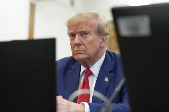 FILE - Former President Donald Trump sits in the courtroom before the start of closing arguments in his civil business fraud trial at New York Supreme Court, Jan. 11, 2024, in New York. Judge Anil Sin ...