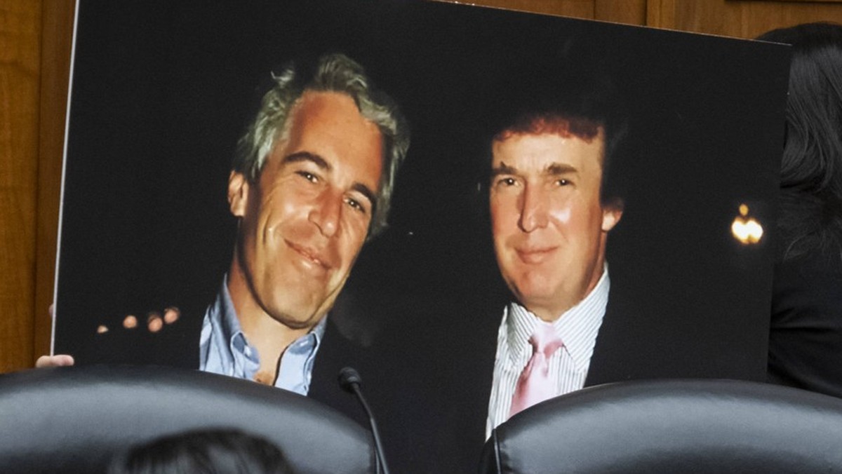 January 10, 2024, Washington, District Of Columbia, USA: United States Representative Jared Moskowitz Democrat of Florida holds a photo board featuring a photo of Jeffrey Epstein and Donald Trump, dur ...