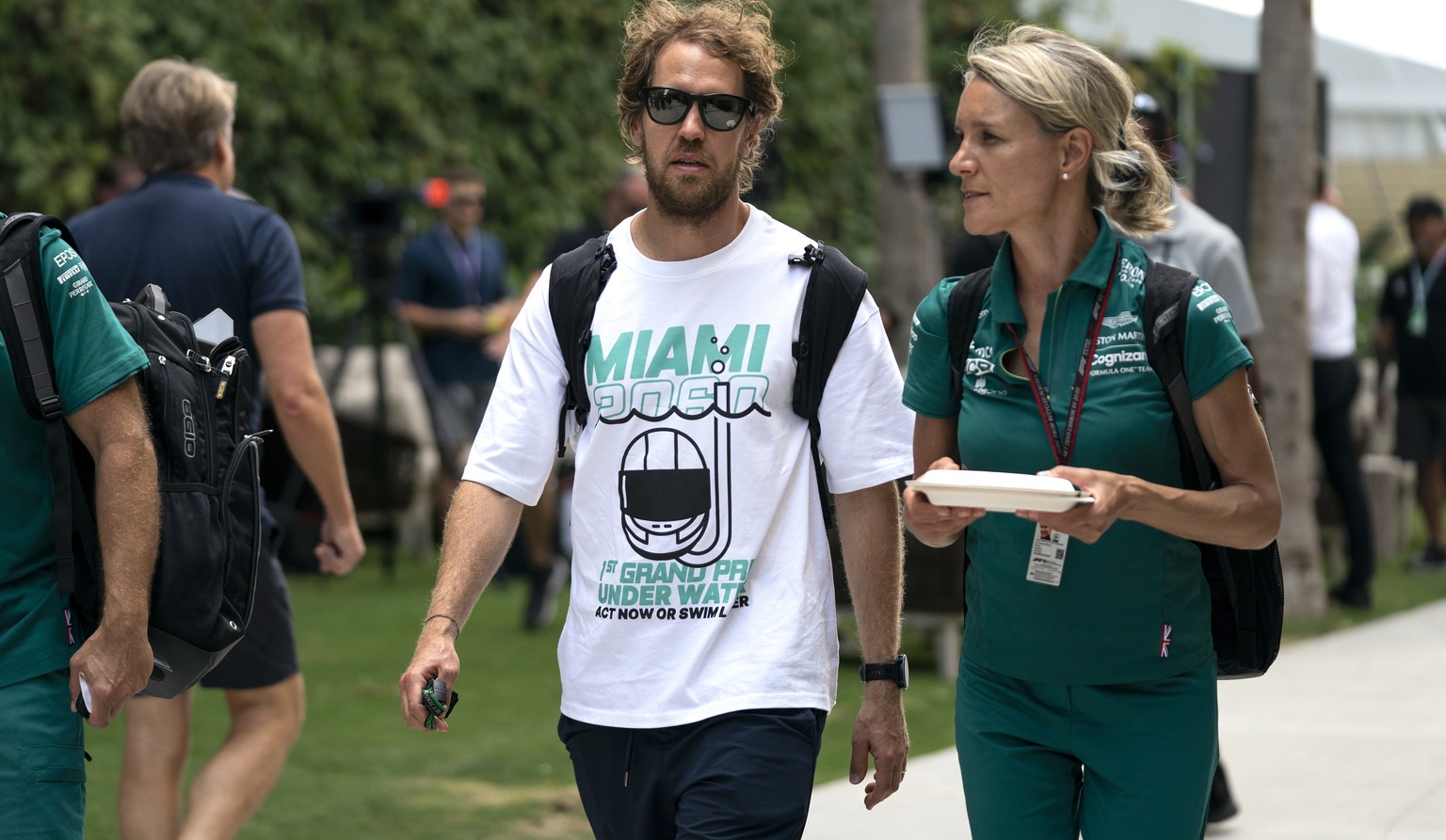 epa09929378 German Formula One driver Sebastian Vettel of Aston Martin arrives for the Formula One Grand Prix of Miami at the Miami International Autodrome in Miami, Florida, USA, 05 May 2022. EPA/GRE ...