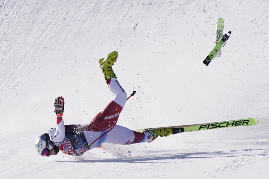 Switzerland&#039;s Urs Kryenbuehl crashes at finish line during an alpine ski, men&#039;s World Cup downhill in Kitzbuehel, Austria, Friday, Jan. 22, 2021. (AP Photo/Giovanni Auletta)