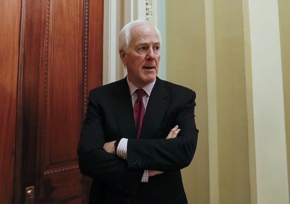 Senate Majority Whip John Cornyn of Texas, pauses as he speaks to reporters outside his office on Capitol Hill in Washington, Monday, June 26, 2017. Senate Republicans unveil a revised health care bil ...