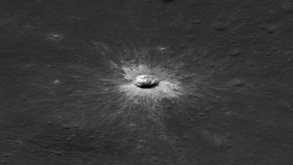 An overhead, close-up view of McGetchin crater that was taken on December 5, 2025, by NASA s Lunar Reconnaissance Orbiter Narrow-Angle Camera. The image covers an area that 3/4 mile wide. Officially n ...