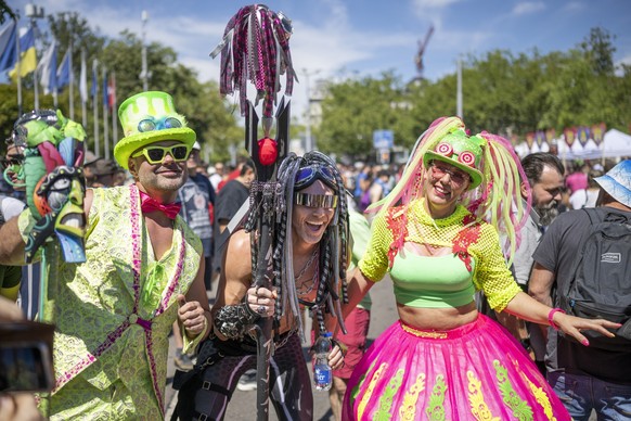 Thousands of participants dancing through the streets during the 29th Street Parade in the city center of Zurich, Switzerland, Saturday, August 13, 2022. The annual dance music event Street Parade run ...