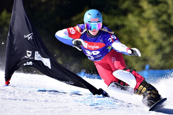 epa09045964 Julie Zogg of Switzerland races down the slope during the women&#039;s Parallel Slalom (PS) Qualification Run at the FIS Snowboard World Championship in Rogla, Slovenia, 02 March 2021. EPA ...