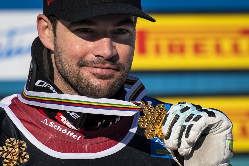 Vincent Kriechmayr of Austria celebrates with the Gold medal for Super-g race during the medals ceremony after the men&#039;s Super-G race at the 2021 FIS Alpine Skiing World Championships in Cortina  ...