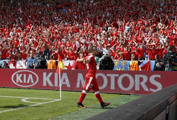 Football Soccer - Switzerland v Poland - EURO 2016 - Round of 16 - Stade Geoffroy-Guichard, Saint-Ãtienne, France - 25/6/16
Switzerland&#039;s Xherdan Shaqiri celebrates with fans after scoring thei ...