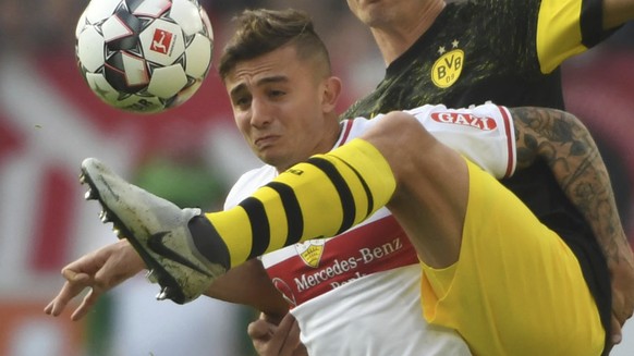 Stuttgart&#039;s Pablo Maffeo, left, and Dortmund&#039;s Thomas Delaney challenge for the ball during a German Bundesliga soccer match between VfB Stuttgart and Borussia Dortmund in Stuttgart, Germany ...