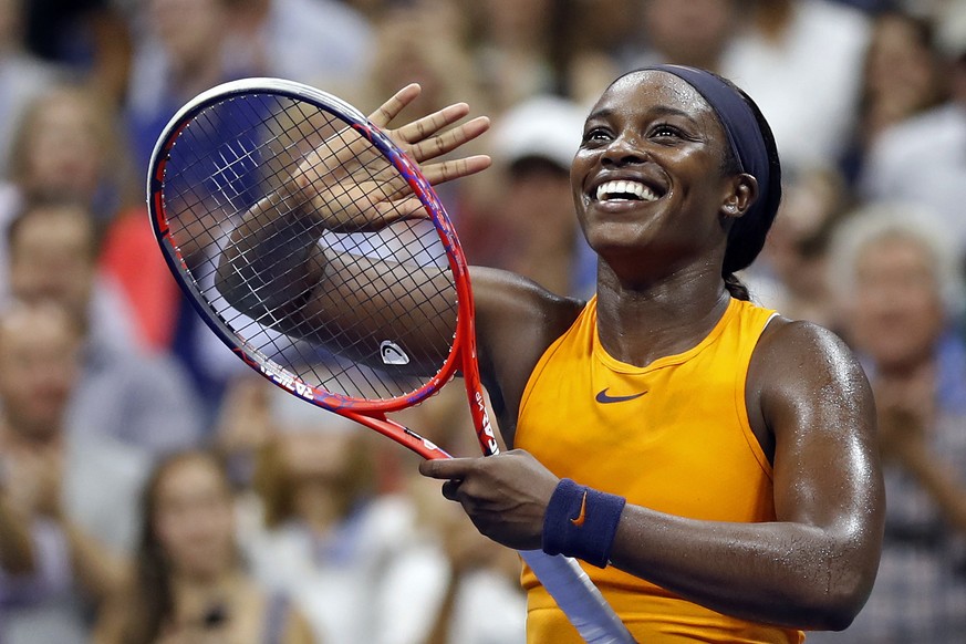 Sloane Stephens, of the United States, smiles after defeating Elise Mertens, of Belgium, during the fourth round of the U.S. Open tennis tournament Sunday, Sept. 2, 2018, in New York. (AP Photo/Adam H ...