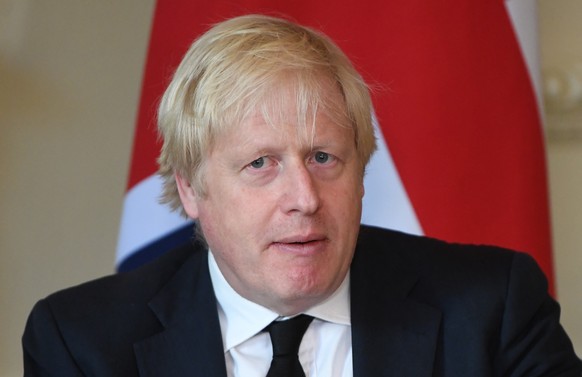 epa09598991 Britain&#039;s Prime Minister Boris Johnson attends a bilateral meeting with President of Israel Isaac Herzog (not pictured) at 10 Downing Street in London, Britain, 23 November 2021. EPA/ ...