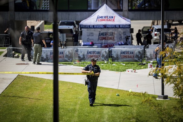 Law enforcement tapes off an area after Charlie Kirk, the CEO and co-founder of the conservative youth organization Turning Point USA, was shot at the Utah Valley University, Wednesday, Sept. 10, 2025 ...