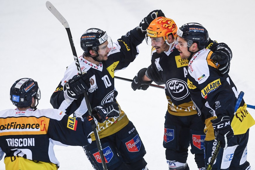 From left, Ambri&#039;s player Noele Trisconi, Ambri&#039;s player Brian Flynn, Ambri&#039;s player Matt D&#039;Agostini and Ambri&#039;s player Nick Plastino , celebrate the 2-2 goal, during the prel ...