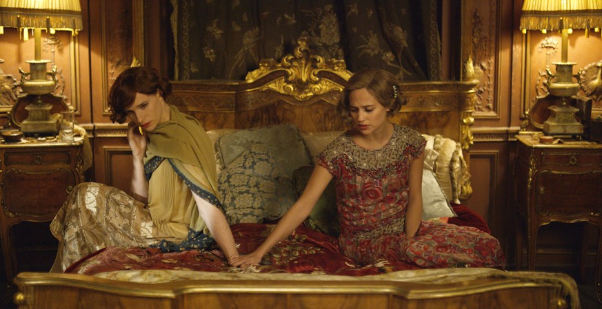 FILE - This file photo provided by Focus Features shows, Eddie Redmayne, left, as Lili Elbe, and Alicia Vikander as Gerda Wegener, in Tom Hoopers &quot;The Danish Girl.&quot; &quot;Carol&quot; and &q ...