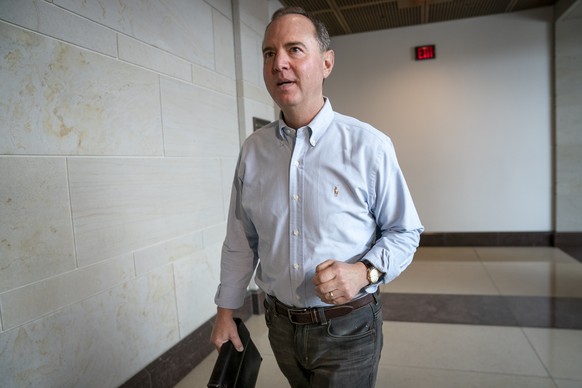 House Intelligence Committee Chairman Adam Schiff, D-Calif., walks to a secure facility in the Capitol to prepare for depositions in the impeachment inquiry of President Donald Trump. (AP Photo/J. Sco ...