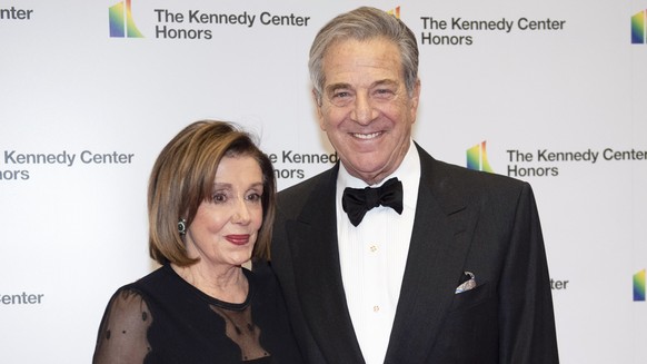 FILE - Speaker of the House Nancy Pelosi, D-Calif., and her husband, Paul Pelosi, arrive at the State Department for the Kennedy Center Honors State Department Dinner, Dec. 7, 2019, in Washington. Hou ...