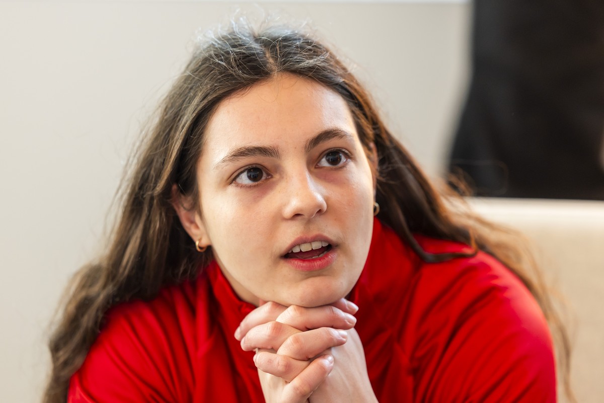 Swiss ice hockey player Nicole Vallario speaks to the media, during a press conference of the Swiss women's ice hockey national team at the House of Switzerland, prior to the 2026 Olympic Winter  ...