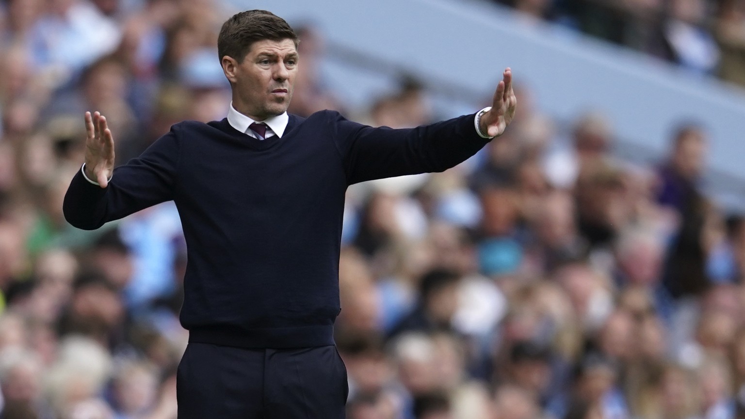 Aston Villa&#039;s head coach Steven Gerrard gestures during the English Premier League soccer match between Manchester City and Aston Villa at the Etihad Stadium in Manchester, England, Sunday, May 2 ...