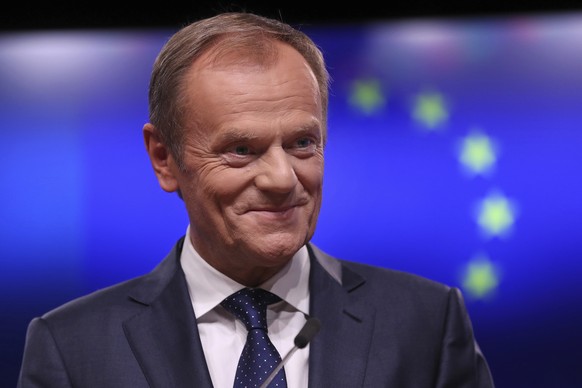 European Council President Donald Tusk smiles as he answers questions during a media conference at the end of an EU-South Africa summit at the Europa building in Brussels on Thursday, Nov. 15, 2018. I ...