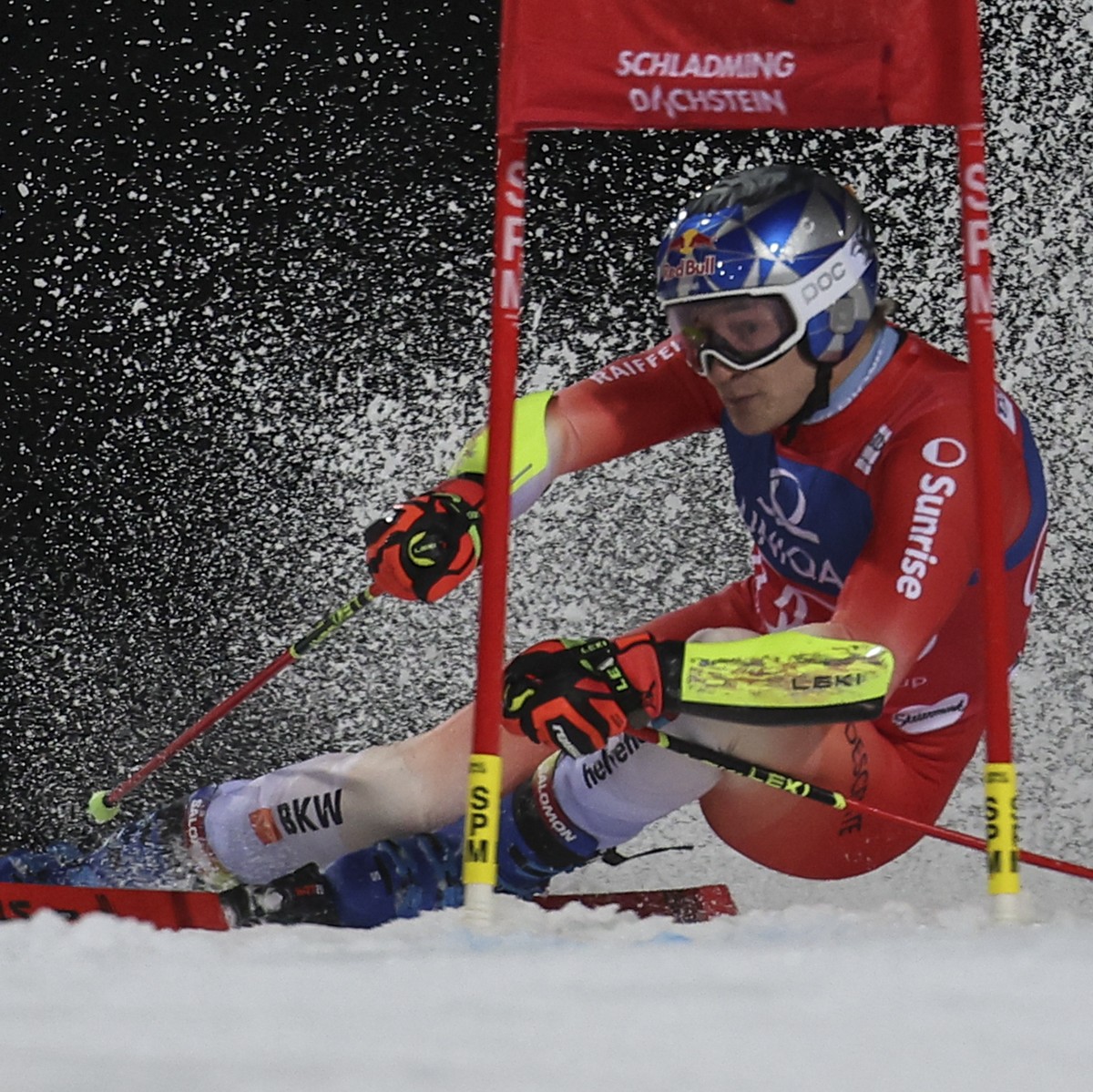 Switzerland's Marco Odermatt speeds down the course during an alpine ski, men's World Cup giant slalom, in Schladming, Austria, Tuesday, Jan. 23, 2024. (AP Photo/Marco Trovati)