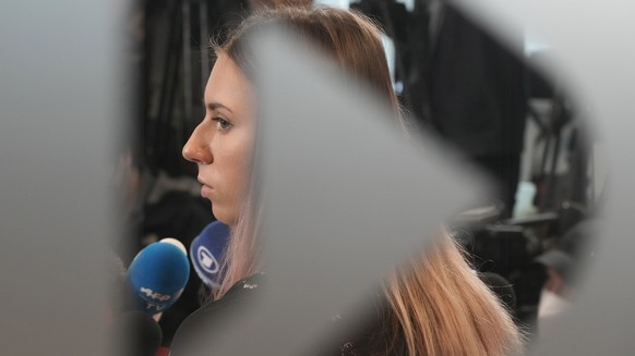 Belarusian Olympic sprinter Krystsina Tsimanouskaya, who came to Poland, fearing reprisals at home after criticizing her coaches at the Tokyo Games, talks to reporters in Warsaw, Poland, Thursday, Aug ...