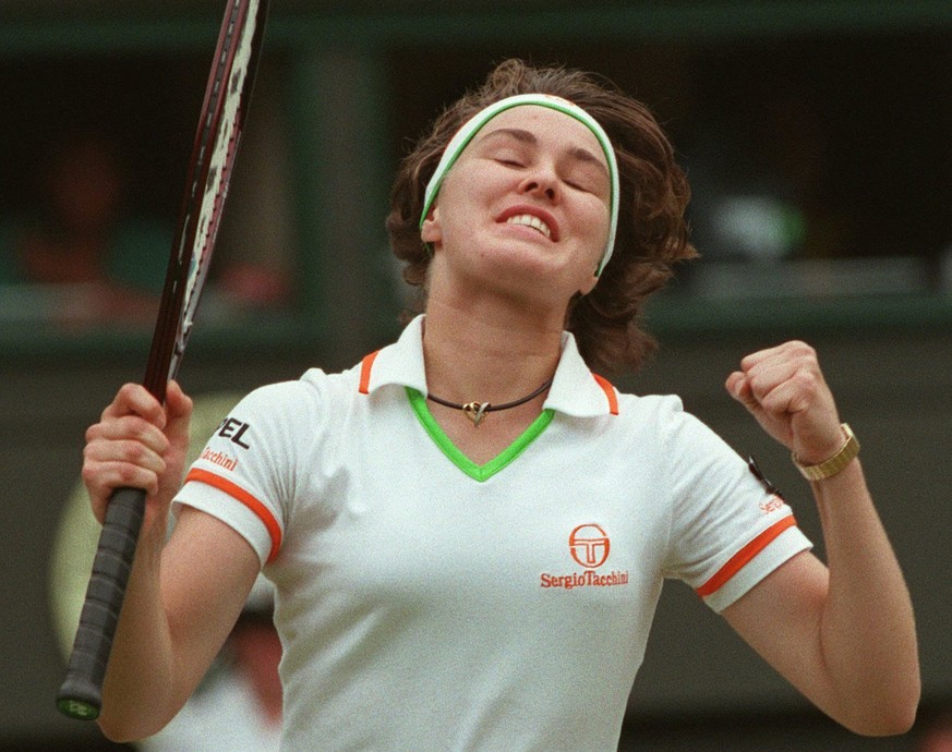 Martina Hingis reacts after defeating Denisa Chadlikova in their Women's Singles quarter final match on the Centre Court at Wimbledon, July 2, 1997. Later she also won the final of the tournament. Mar ...