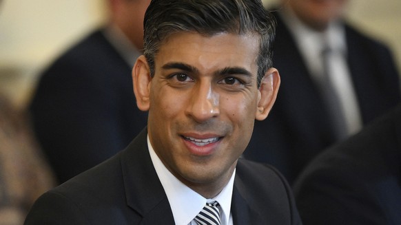 FILE - Britain&#039;s Chancellor of the Exchequer Rishi Sunak attends a cabinet meeting at 10 Downing Street, London, May 24, 2022. The contest to succeed British Prime Minister Boris Johnson has no s ...