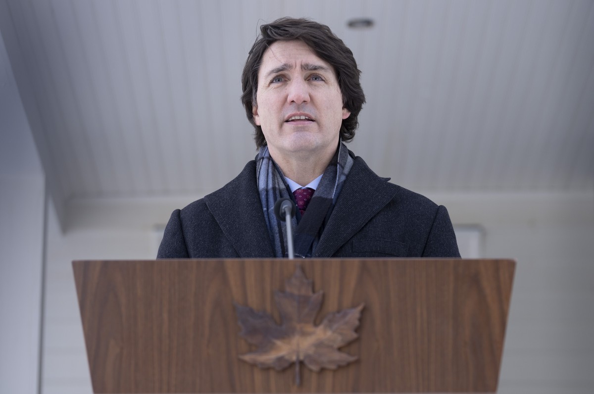 Canadian Prime Minister Justin Trudeau speaks with the media during his first availability after announcing he has COVID-19 at a location in the National Capital Region, Monday, Jan. 31, 2022. Trudeau ...