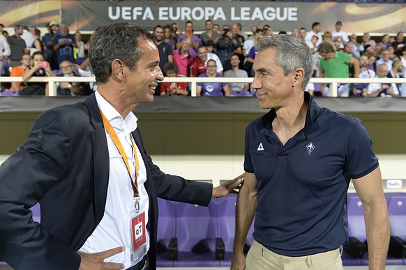 Basel&#039;s president Bernhard Heusler, left, and Fiorentina&#039;s Portuguese head coach Paulo Sousa, right, prior to the UEFA Europa League group I group stage matchday 1 soccer match between Italy ...