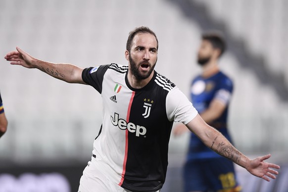 Juventus' Gonzalo Higuain celebrates after a goal during the Serie A soccer match between Juventus and Lecce, at the Allianz Stadium in Turin, Italy, Friday, June 26, 2020. (Fabio Ferrari/LaPress ...