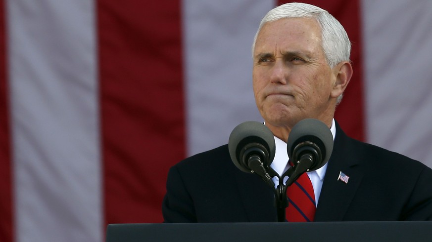 Vice President Mike Pence pauses while speaking during a Veterans Day ceremony at Arlington National Cemetery, Saturday, Nov. 11, 2017 in Washington. (AP Photo/Alex Brandon)