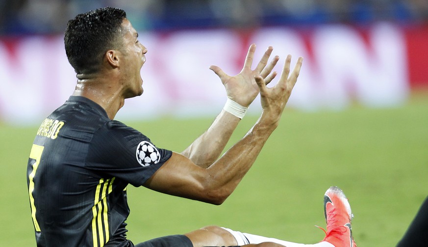 Juventus forward Cristiano Ronaldo reacts after receiving a red card during the Champions League, group H soccer match between Valencia and Juventus, at the Mestalla stadium in Valencia, Spain, Wednes ...