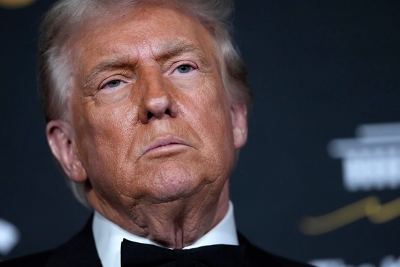 President Donald Trump walks the red carpet before the 48th Kennedy Center Honors, Sunday, Dec. 7, 2025, at the John F. Kennedy Center for the Performing Arts in Washington. (AP Photo/Julia Demaree Ni ...