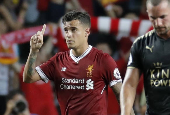 FILE - A Saturday, July 22, 2017, file photo of Liverpool&#039;s Philippe Coutinho celebrating after scoring a goal during the final match against Leicester City FC at the Premier League Asia Trophy s ...