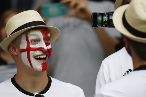 Football Soccer - Slovakia v England - EURO 2016 - Group B - Stade Geoffroy-Guichard, Saint-Étienne, France - 20/6/16
England fan with face paint poses for a photo before the game
REUTERS/Kai Pfaffenbach
Livepic