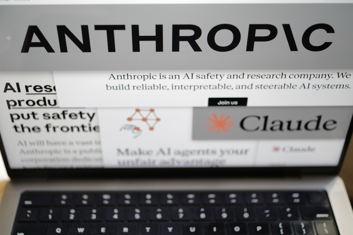 FILE - Pages from the Anthropic website and the company's logos are displayed on a computer screen in New York on Thursday, Feb. 26, 2026. (AP Photo/Patrick Sison, File)
Anthropic