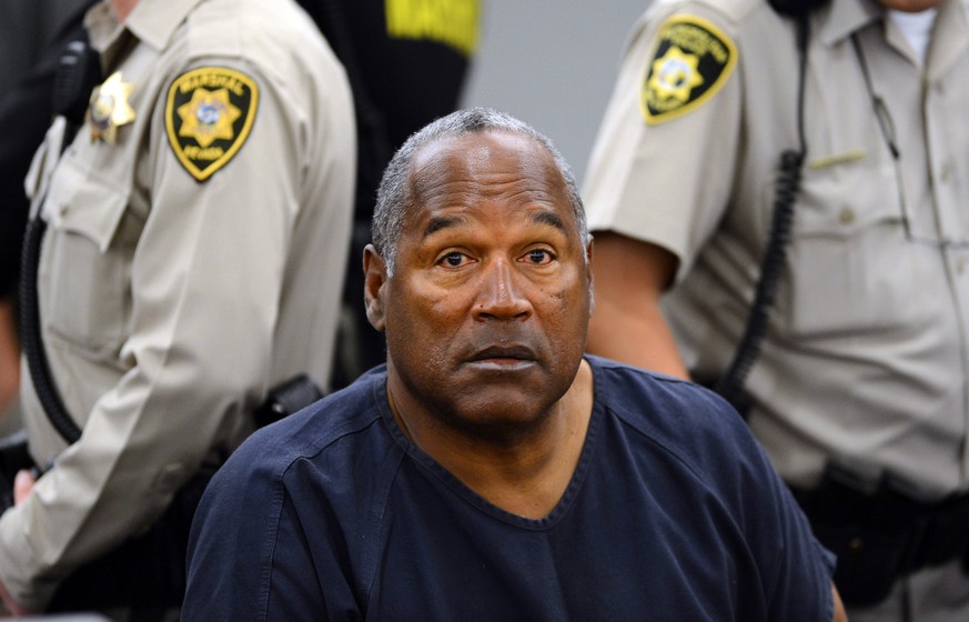 FILE - In this May 14, 2013, file photo, O.J. Simpson sits during a break on the second day of an evidentiary hearing in Clark County District Court in Las Vegas. Los Angeles police are investigating  ...