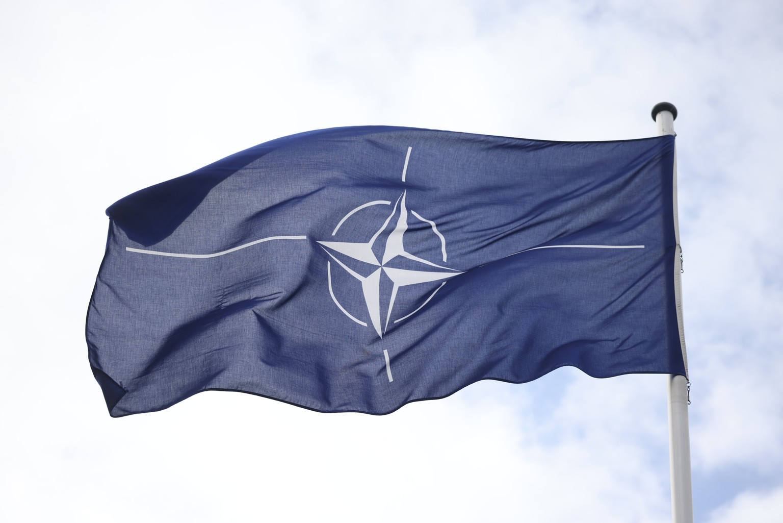 epa11258626 A NATO flag waves outside the German Ministry of Defense in Berlin, Germany, 04 April 2024. German Defense Minister Pistorius presented on the day his plans for a new structure of the coun ...