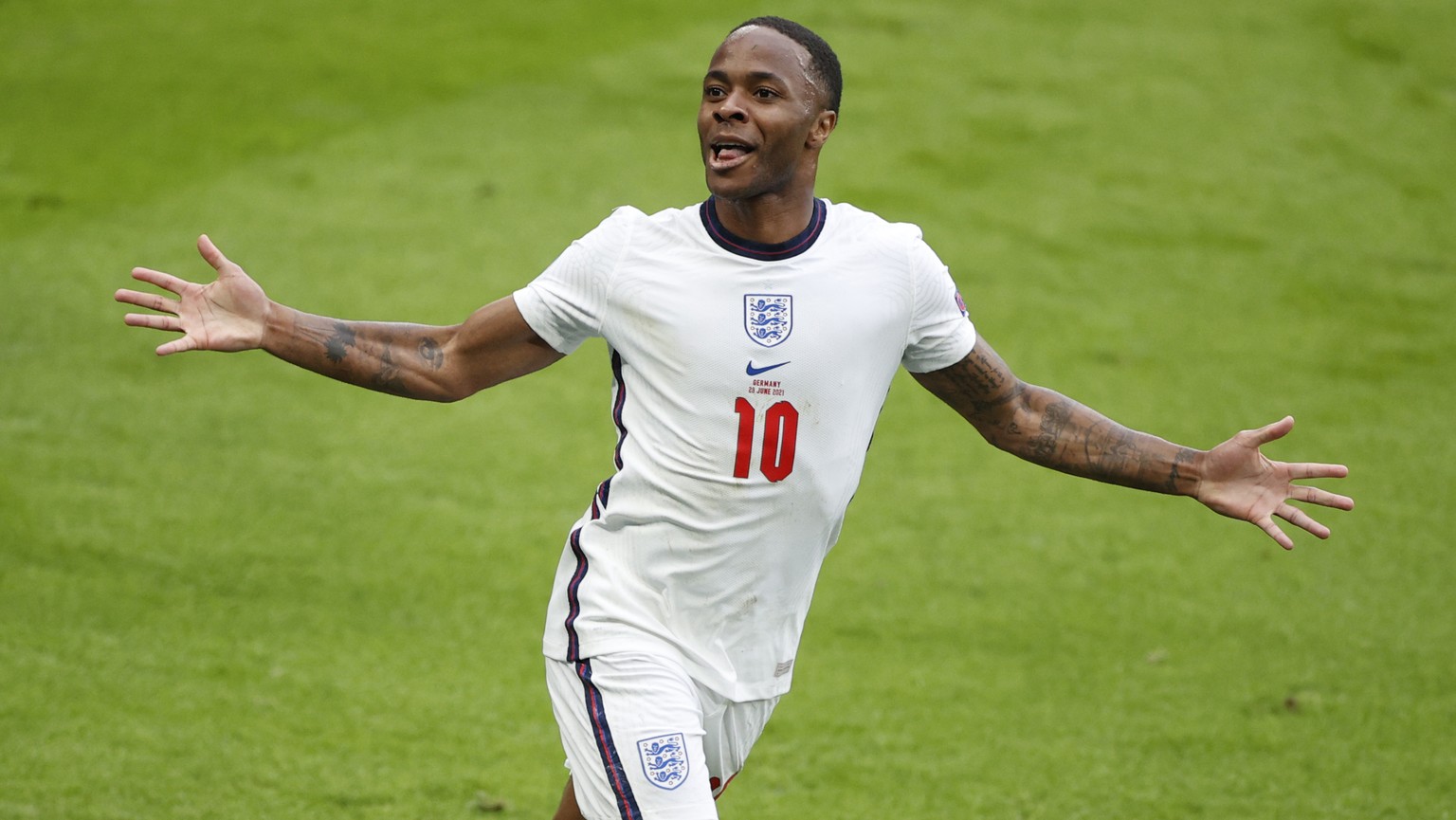 England&#039;s Raheem Sterling celebrates after scoring his side&#039;s opening goal during the Euro 2020 soccer match round of 16 between England and Germany at Wembley stadium in London, Tuesday, Ju ...