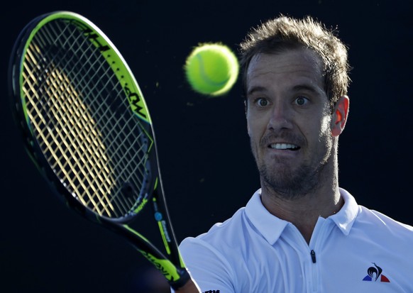 France&#039;s Richard Gasquet looks to make a return to Slovenia&#039;s Blaz Kavcic during their first round match at the Australian Open tennis championships in Melbourne, Australia, Tuesday, Jan. 16 ...