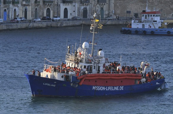 FILE - In this June 27, 2018 file photo, the ship operated by German aid group Mission Lifeline, carrying 234 migrants, arrives at the Valletta port in Malta, after a journey of nearly a week while aw ...