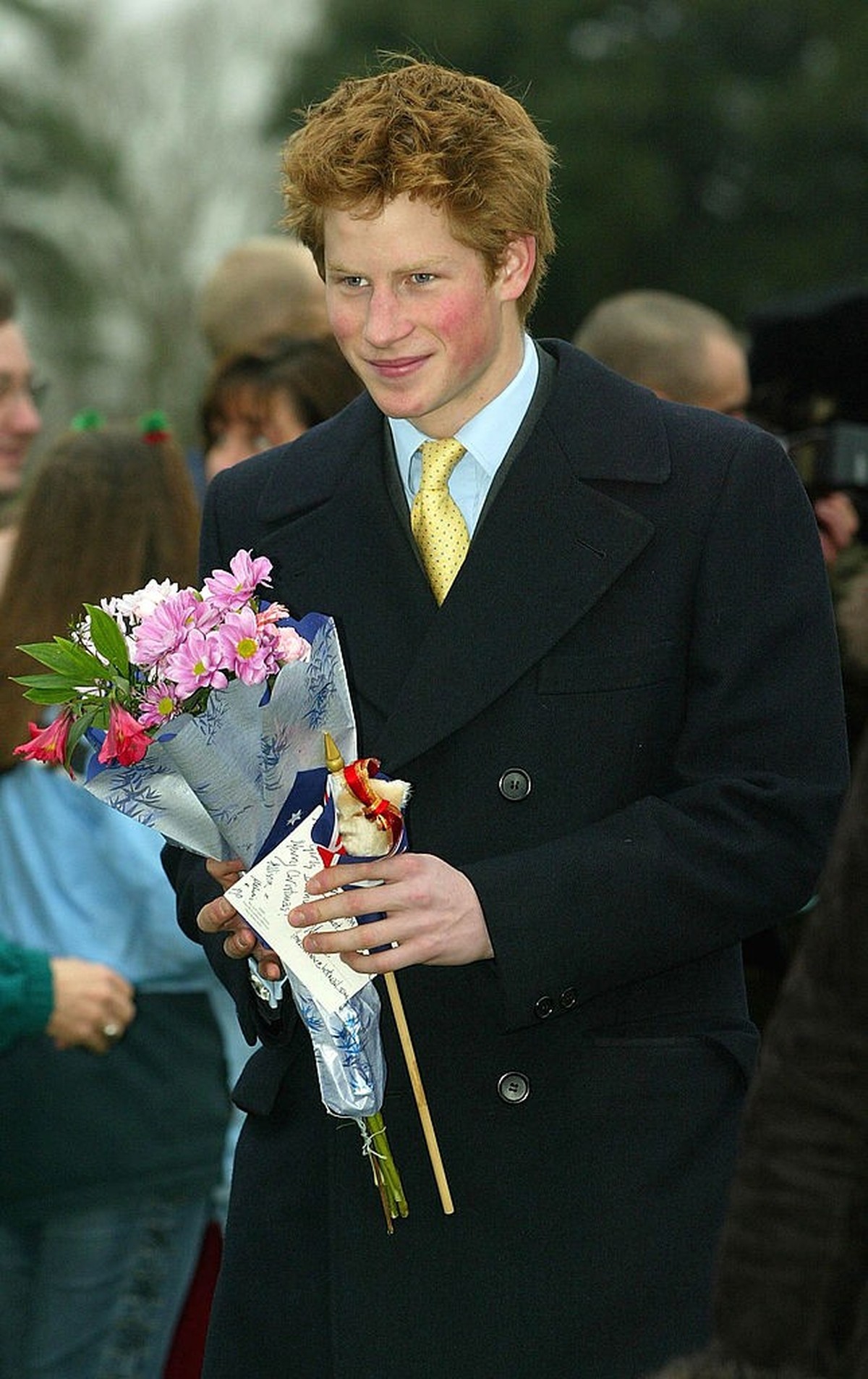 SANDRINGHAM, UNITED KINGDOM - DECEMBER 25: Britain's Prince Harry, and other members of the British Royal family, leave a Christmas Day service at Sandringham Church December 25, 2002 in Sandring ...