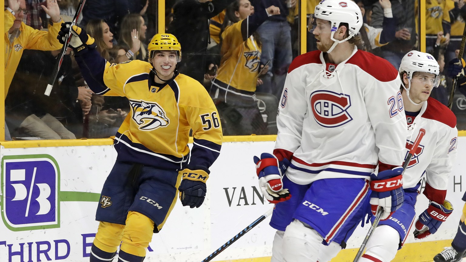 Nashville Predators left wing Kevin Fiala (56), of Switzerland, celebrates after scoring a goal against the Montreal Canadiens during the second period of an NHL hockey game Tuesday, Jan. 3, 2017, in  ...