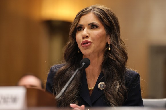 epa11831415 South Dakota governor Kristi Noem, President-elect Donald Trump&#039;s pick to lead the Department of Homeland Security, testifies at her confirmation hearing in the Dirksen Senate Office  ...