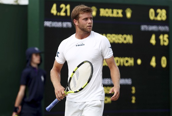 Ryan Harrison walks during a break in play in his match against Tomas Berdych during their Men&#039;s Singles Match at the Wimbledon Tennis Championships in London Thursday, July 6, 2017. (Gareth Full ...