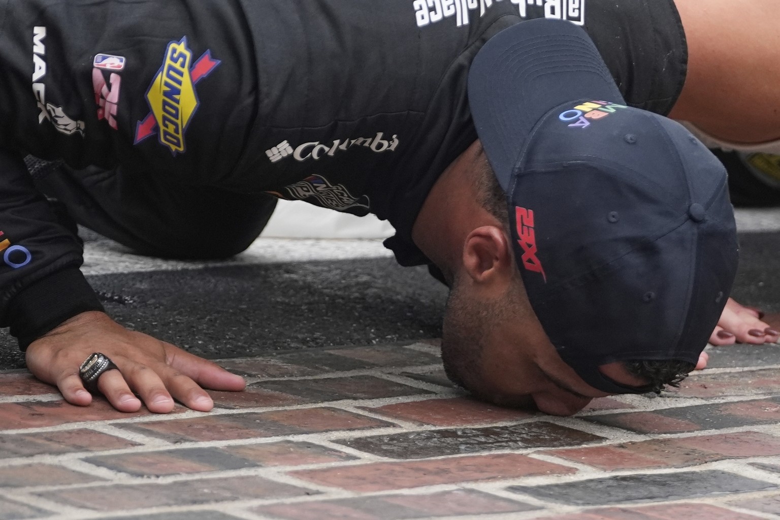 Bubba Wallace kisses the &quot;Yard of Bricks&quot; after winning a NASCAR Cup Series auto race at Indianapolis Motor Speedway, Sunday, July 27, 2025, in Indianapolis. (AP Photo/Darron Cummings)
NASCA ...