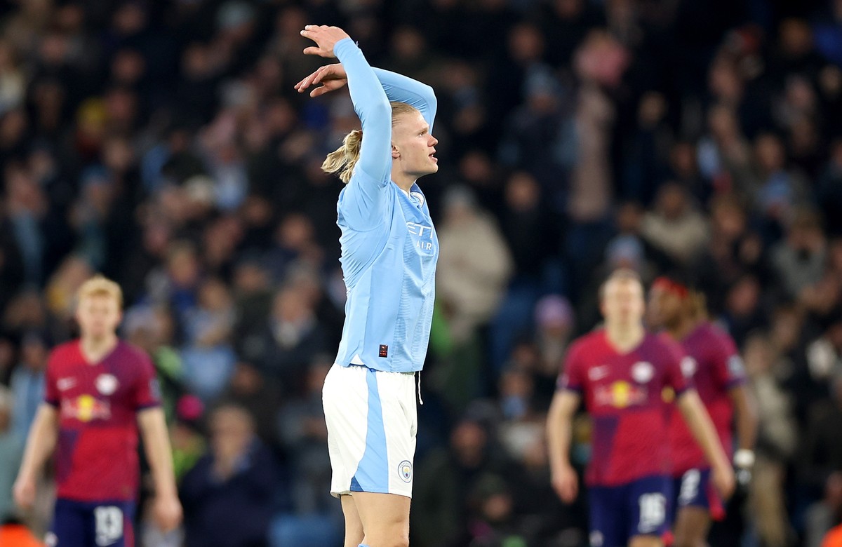 epa11000071 Erling Haaland of Manchester City celebrates after scoring his team's first goal during the UEFA Champions League group G match between Manchester City and RB Leipzig in Manchester, B ...