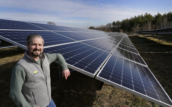 Mike Lucini, vice president of ISM Solar, poses, Tuesday Jan. 26, 2021, in Burrillville, R.I., at ISM&#039;s 10-acre solar farm which is the first of its kind in the state. U.S. President Joe Biden wa ...