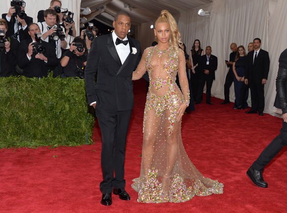 Jay-Z, left, and Beyonce arrive at The Metropolitan Museum of Art&#039;s Costume Institute benefit gala celebrating &quot;China: Through the Looking Glass&quot; on Monday, May 4, 2015, in New York. (P ...