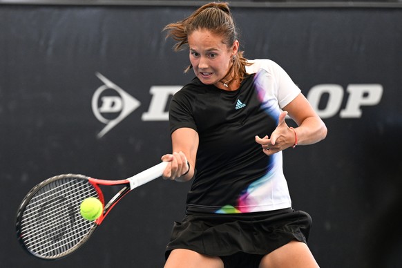 epa10404125 Daria Kasatkina of Russia in action against Belinda Bencic of Switzerland during the 2023 Adelaide International Tennis Tournament at the Memorial Drive Tennis Centre in Adelaide, Australi ...