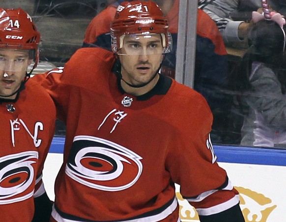 Carolina Hurricanes&#039; Justin Williams, center, celebrates with teammates Justin Faulk (27) and Nino Niederreiter, right, after scoring a goal against the Florida Panthers during the third period o ...