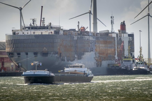 epa10790791 The damaged freighter Fremantle Highway is docked in Julianahaven of Eemshaven, The Netherlands, 08 August 2023. An inspection revealed that a large number of cars on the lower decks of th ...